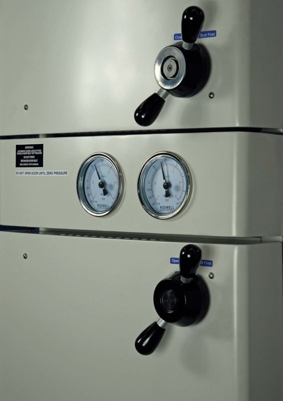 Chamber door locks and pressure gauges